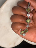 Green quatrefoil charm bracelet
